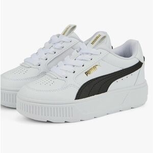 White Pumas in 5.5 Youth size / equivalent to a Women’s size 7 worn once .